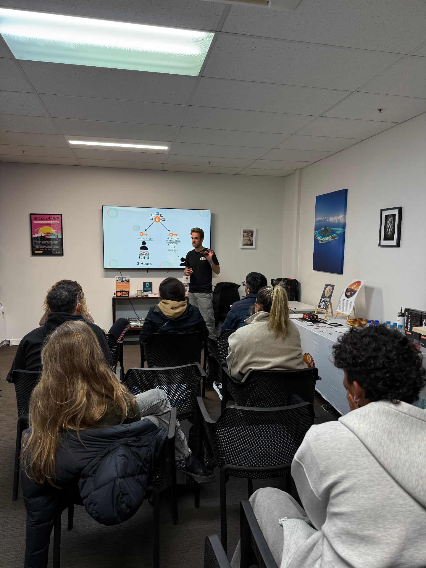 Self-custody explained on screen, workshop audience